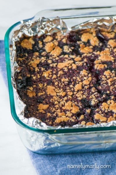 The foil makes cleanup go so smoothly with these Vegan Blueberry Lemon Pie Bars