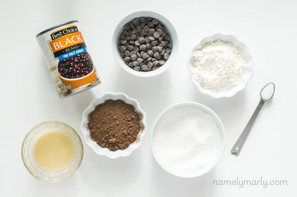 Ingredients to make vegan black bean brownies on a white counter top.