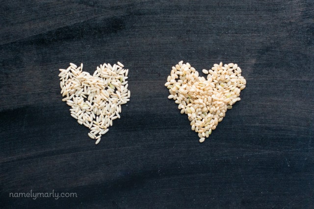Two forms of brown rice grains have been formed into heart shapes.