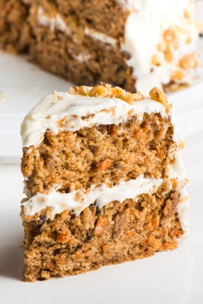 Vegan Carrot Cake with layers of delicious cake topped with vegan cream cheese frosting.