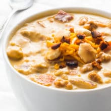 Take a bite out of this delicious Vegan Cheeseburger Soup recipe and come back for more. It's a creamy soup made with cashews, potatoes, carrots, and cheese. A perfect weeknight meal.
