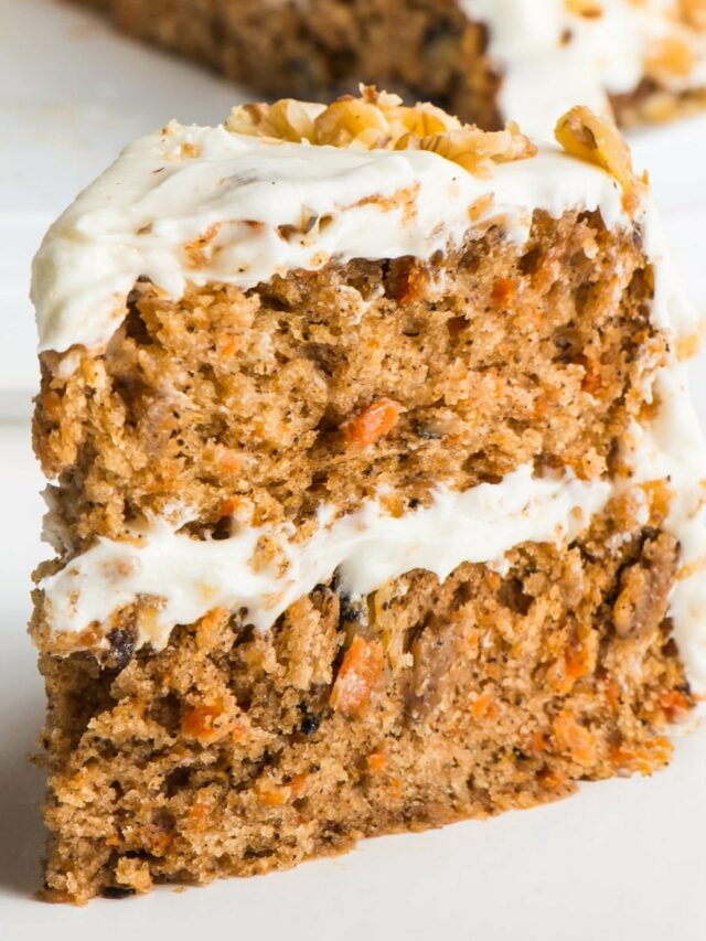 Vegan Carrot Cake with layers of delicious cake topped with vegan cream cheese frosting.