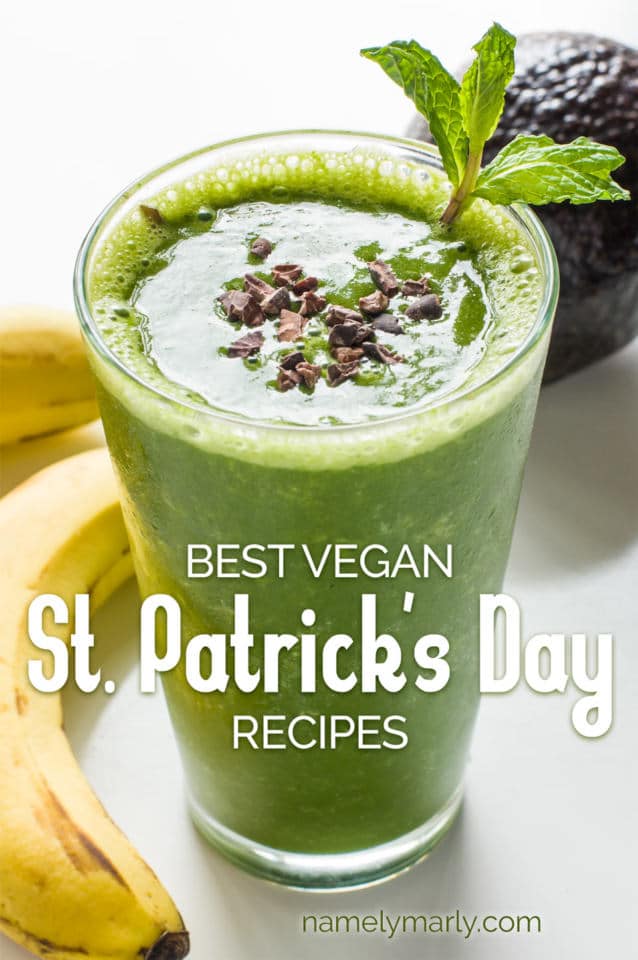 A vegan shamrock shake with fresh mint and chocolate shavings is surrounded by bananas and an avocado. The text overlay reads: Best Vegan St. Patrick's Day Recipes.