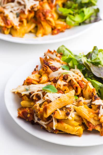 This Easy Vegan Garlic Pasta is a creamy, garlic pasta, covered in red sauce and dripping with delicious vegan cheese. It's easy to make and healthy too! We love to serve this on a Friday night and enjoy leftovers for the week. It's fancy enough to share as a family dinner, but simple enough so you can enjoy your guests too!