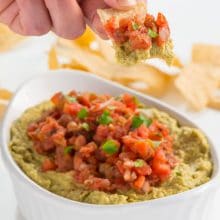 Have a bite of this Green Chili Humus with Salsa! It's perfect for you next game day party!
