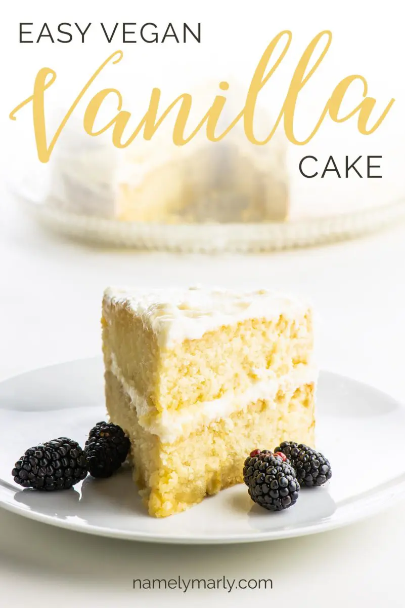 A slice of layered vegan vanilla cake has blackberries sitting next to it. The text above it reads: Vegan Vanilla Cake.