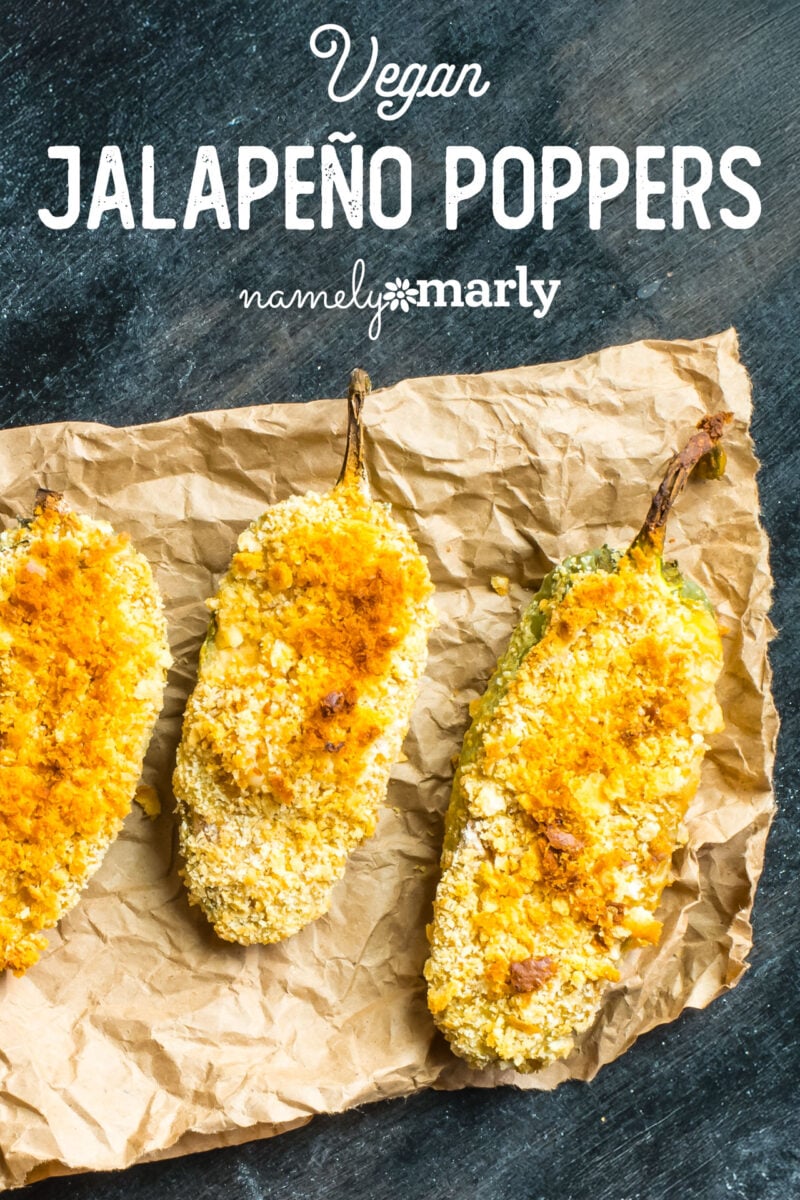 Looking down on 3 stuffed jalapenos with text that says Vegan Jalapeno Poppers