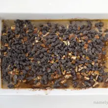 Chocolate chips have been added to this unbaked chocolate dump cake.