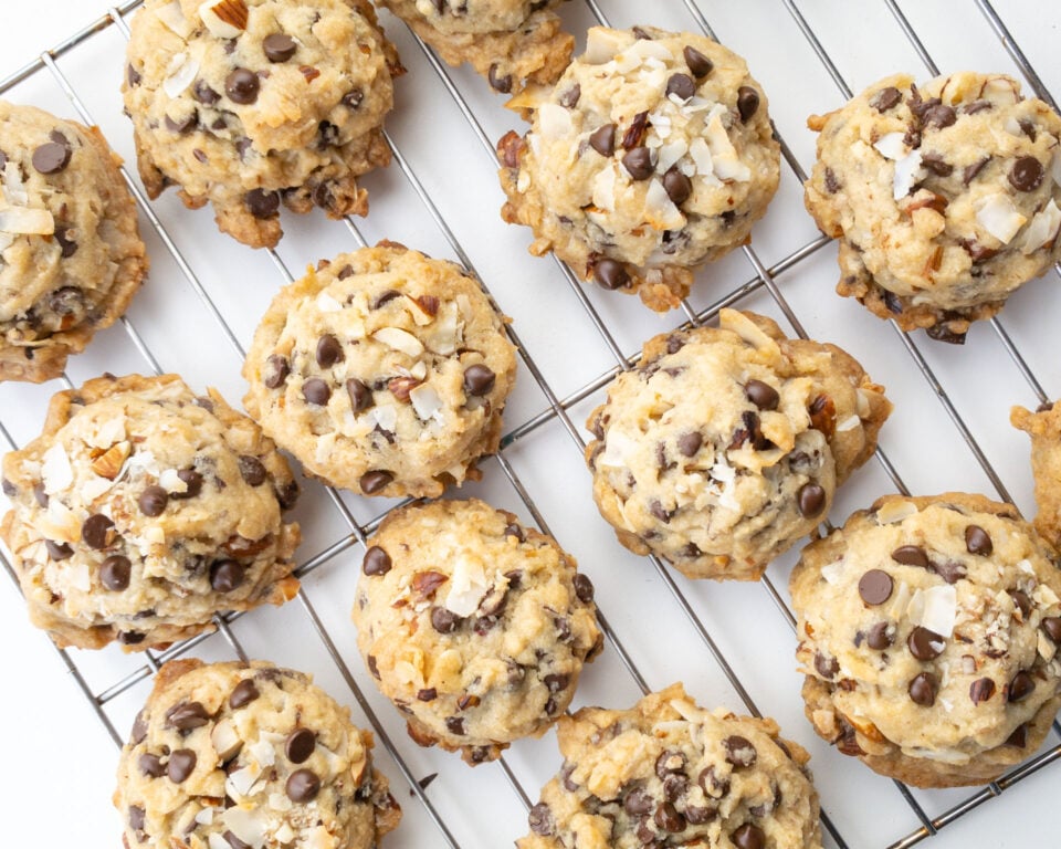 Looking down on a wire cooling rack full of almond joy cookies.