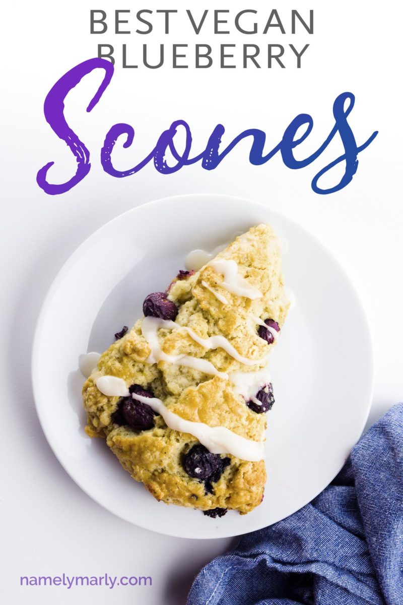 Looking down on a scone on a plate. The text above it reads, "Best Vegan Blueberry Scones."