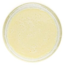 A bowl full of liquid ingredients.