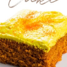 A piece of orange colored cake on a plate has this text above it: Orange Turmeric Cake.