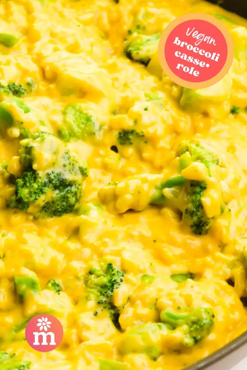 A pan full of cheesy broccoli rice mixture has this text on it: Vegan Broccoli Casserole.
