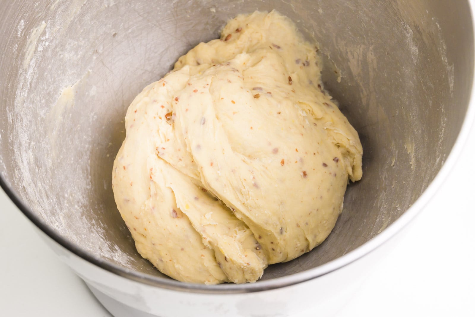 Dough is in the bottom of a bowl.