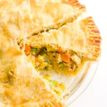 Looking down on a vegan pot pie with a slice cut out.