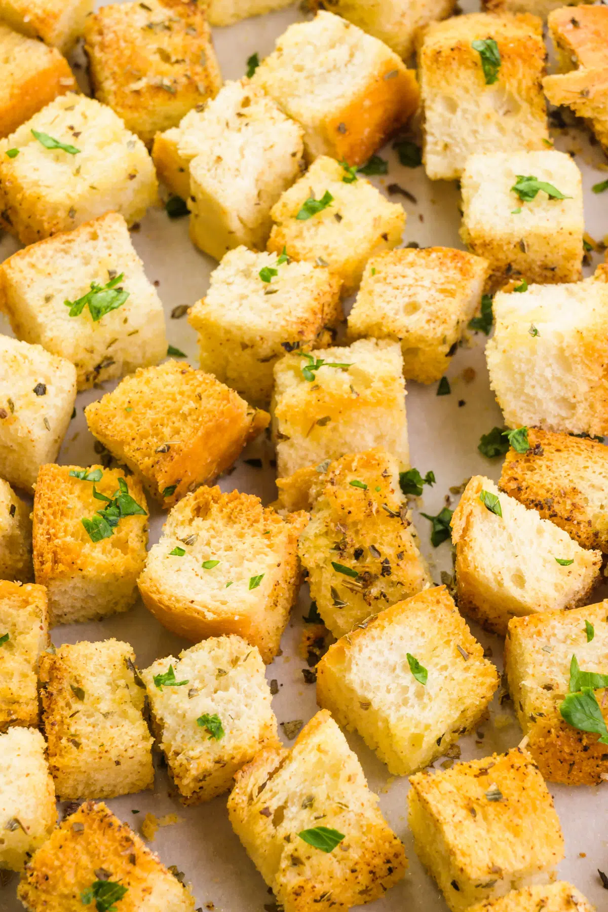 Looking down on a pan with freshly baked croutons.