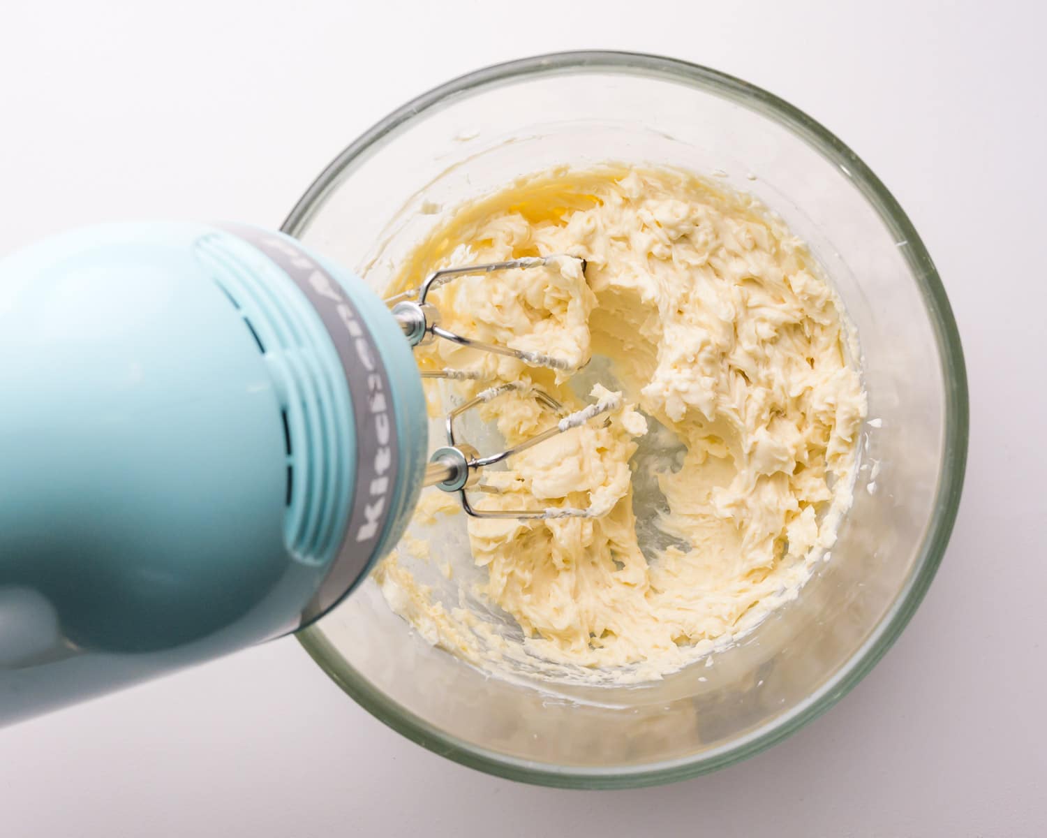 A mixer is whipping up vegan butter.