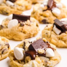 Several vegan s'mores cookies sit on a white countertop.