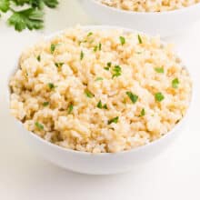 Top a bowl of brown rice with chopped parsley.