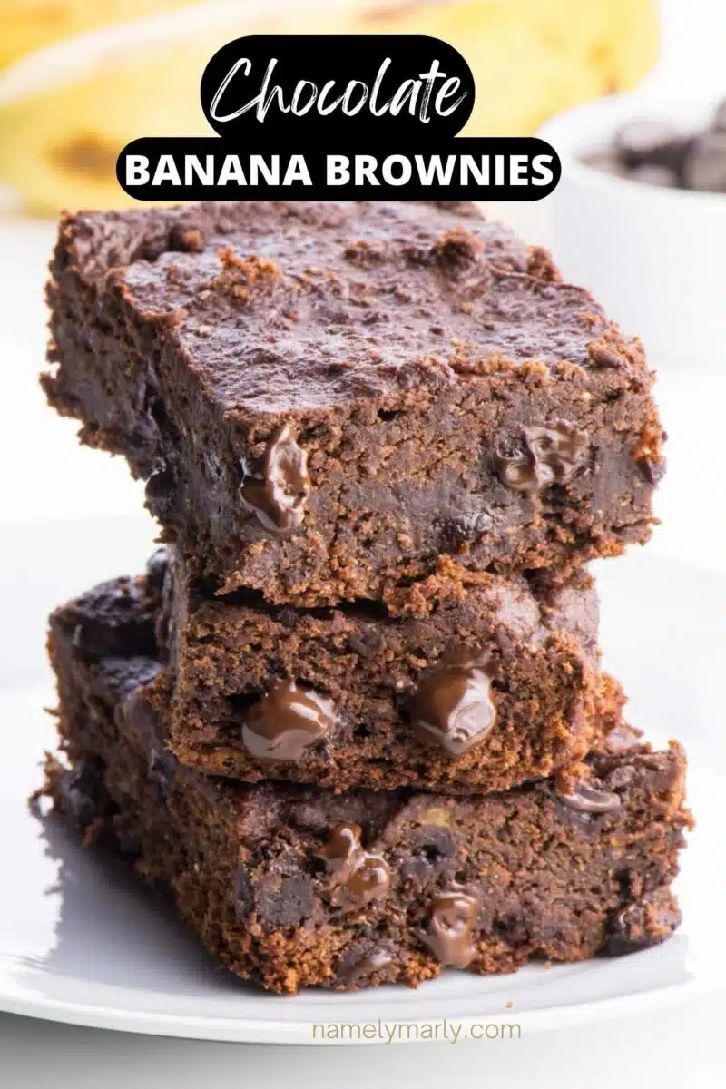 A stack of three brownies shows bananas in the background. The text reads, Chocolate Banana Brownies.