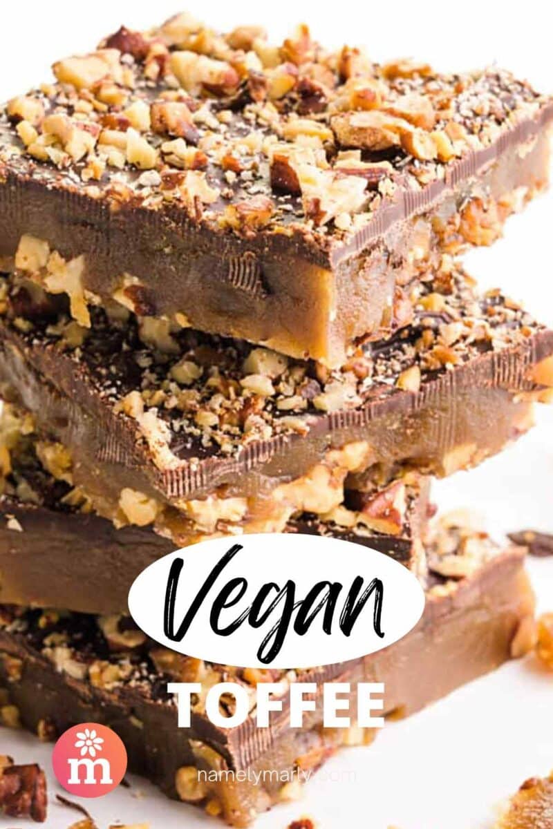 A stack of toffee bars sits on a white table.  Text written, vegan toffee.