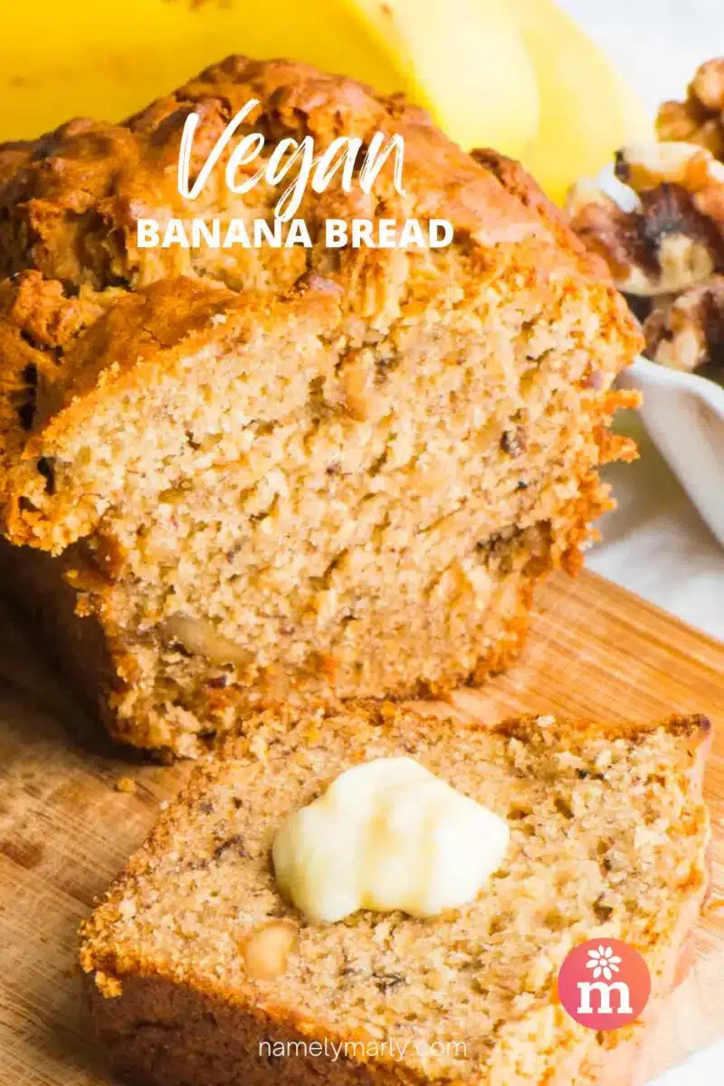 A loaf of banana bread has a slice sitting in front of it with a bit of butter. The text reads, Vegan Banana Bread.