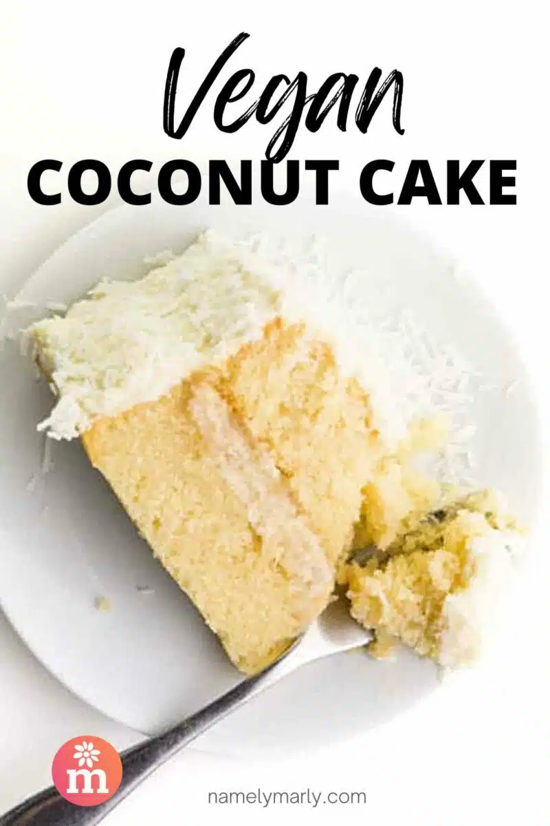 A slice of layered cake is on a plate with a forkful of cake next to it. The text on the image reads, Vegan Coconut Cake.