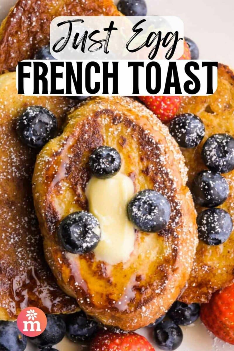Looking at a plate of French toast slices with melted butter and blueberries.  The text reads, Just French Toast.