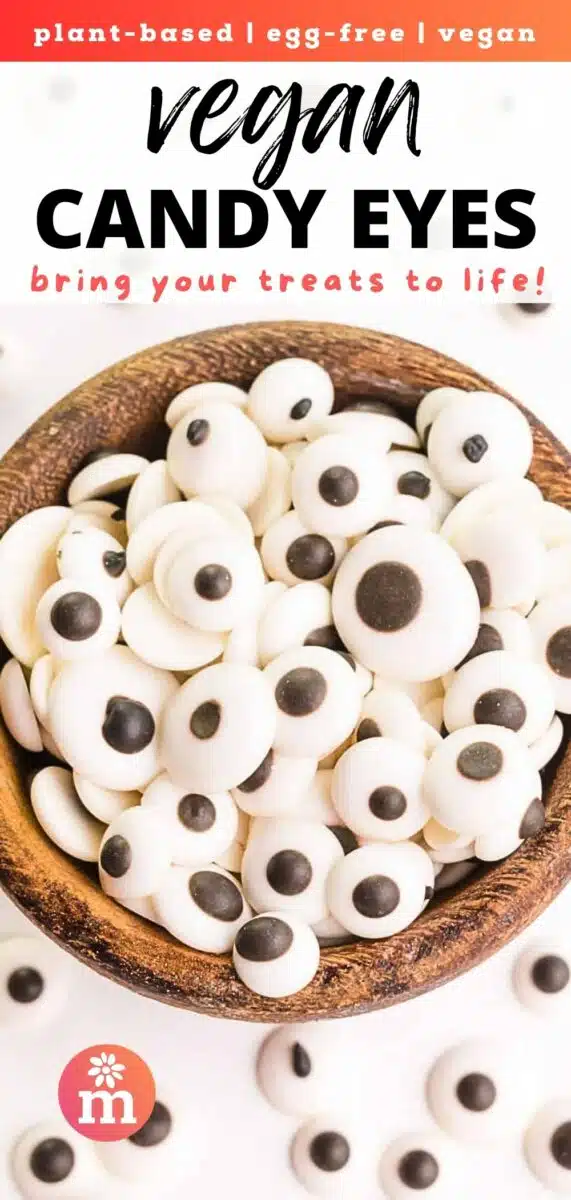 Looking down on a wooden bowl with edible eyes. The text reads, Plant-based, Egg-free, Vegan Candy Eyes. Bring Your treats to life!
