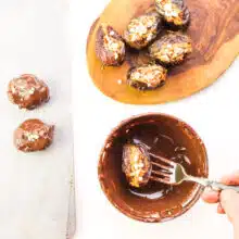 Dates stuffed with peanut butter are being dipped in melted chocolate.