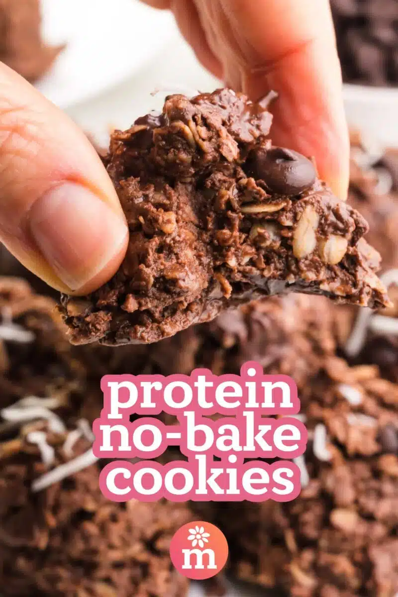A hand holds a chocolate cooky over a plate with more cookies. The text reads, protein no-bake cookies.