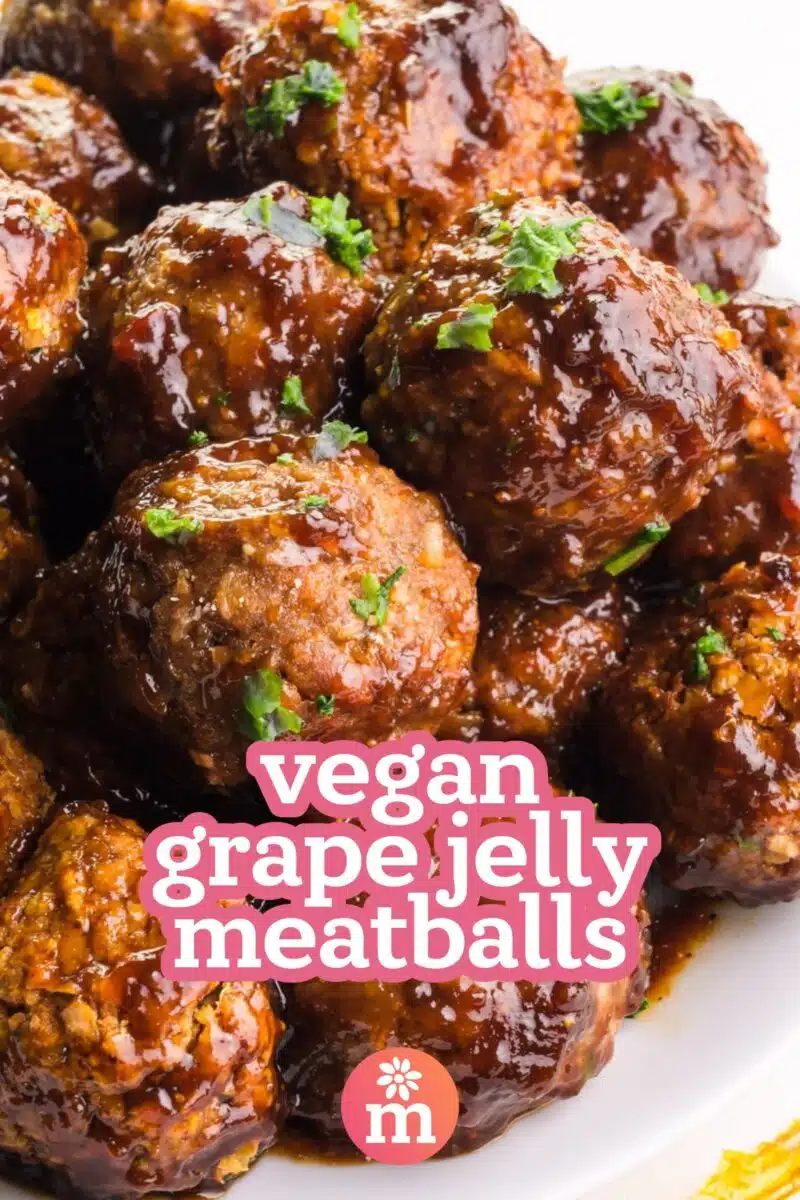 A plate holds saucy meatballs. The text reads, vegan grape jelly meatballs.