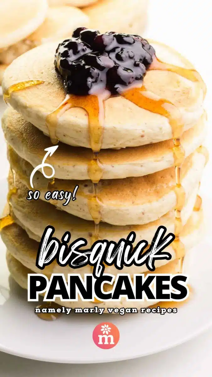 A stack of pancakes has blueberries on top and syrup. An arrow points to the stack with the text reading, so easy! Text at the bottom reads, Bisquick Pancakes, Namely Marly Vegan Recipes.