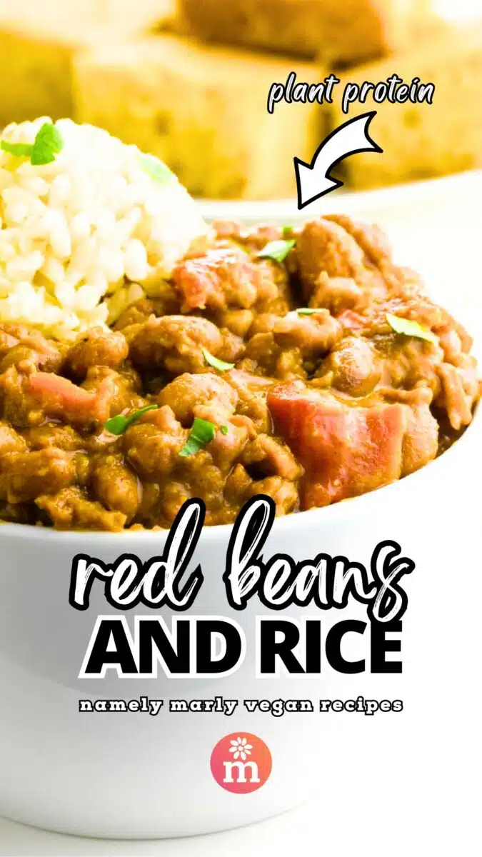 A bowl of beans with rice sits in front of a plate of cornbread. The text reads, Plant Protein with an arrow pointing to the dish. Below that reads, Red Beans and Rice, Namely Marly Vegan Recipes.