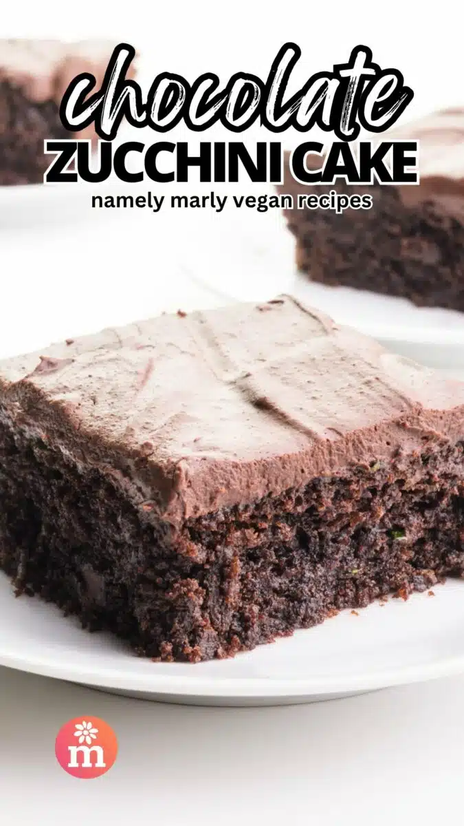 A slice of cake with chocolate frosting sits on a plate. The text reads, Chocolate Zucchini Cake, Namely Marly Vegan Recipes.