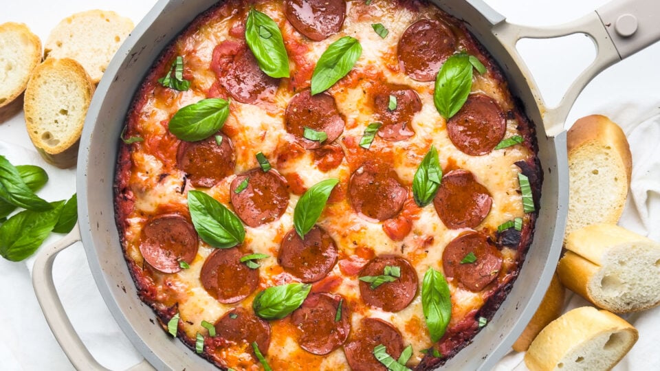 Looking down on a skillet with vegan pizza dip in it.