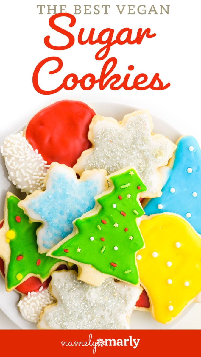 A beautiful photo of Christas decorated sugar cookies. The text reads, Vegan Christmas Sugar Cookies.