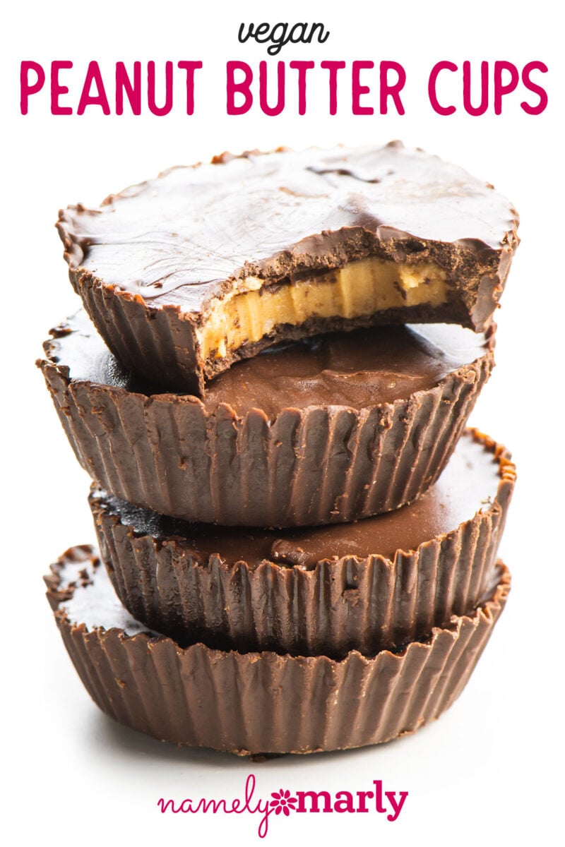 a stack of peanut butter cups with a bite taken out of the top cup with text that reads vegan peanut butter cups